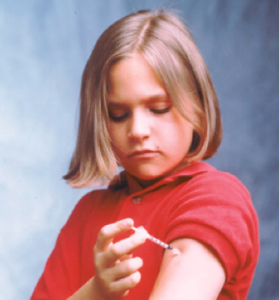 Child giving diabetic shot
